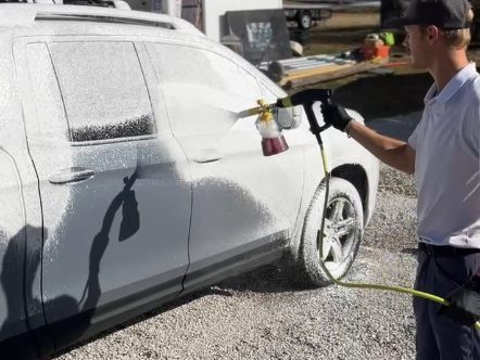 Water beading on a freshly waxed panel